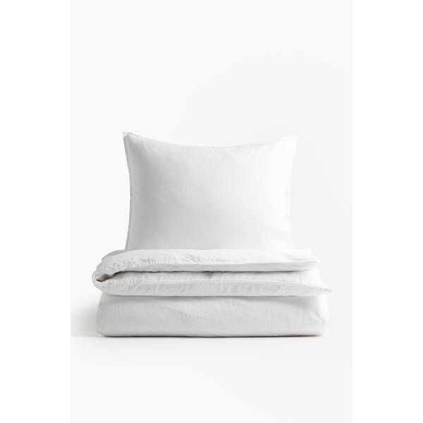 H&M HOME Meta ad example started 2026-04-24: Anneaux de rideau de douche, Anneaux de rideau de douche, Parure de couette lit simple en lin, Parure de couette lit double King size en lin, Taie d'oreiller en lin lavé, Parure de couette lit simple en lin